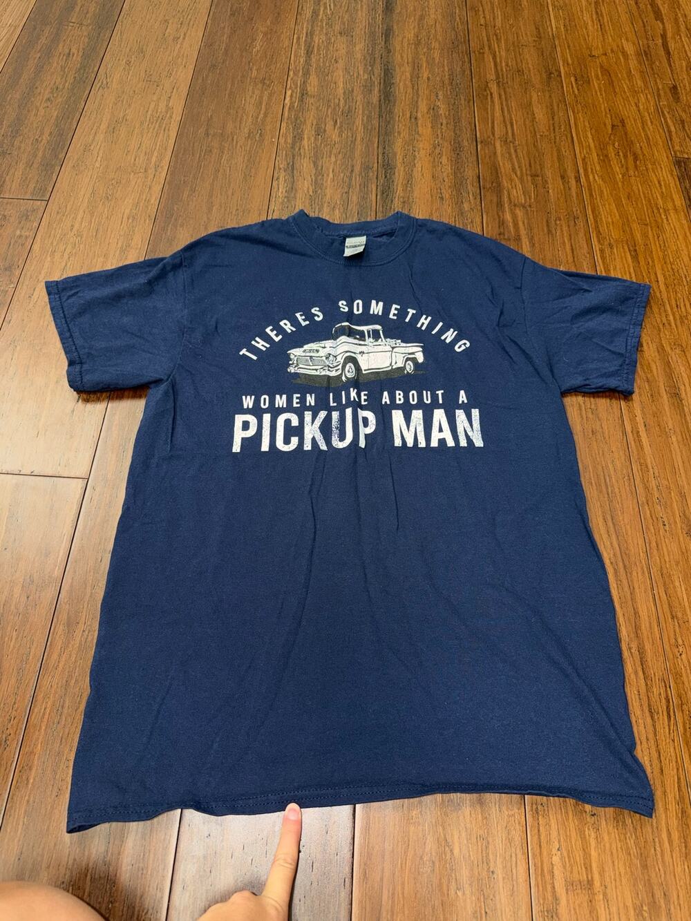 Medium Something Women Like About a Pickup Man" graphic Tee
